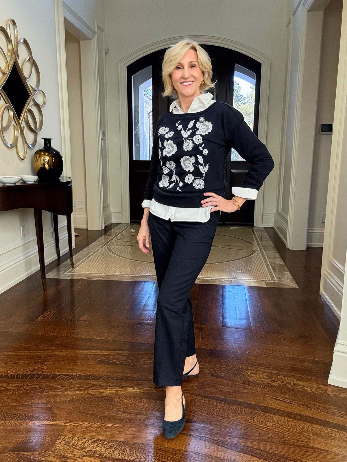 blue embroidered sweatshirt, blue pants