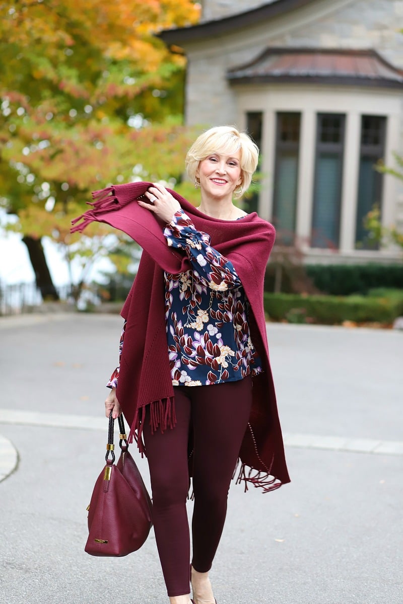 burgundy and navy blouse with burgundy pants and burgundy poncho