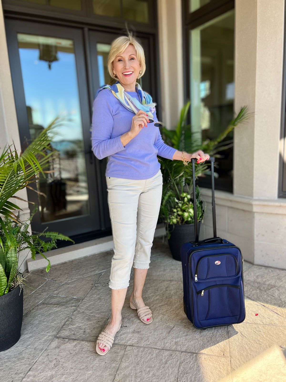 capris and purple top for travel