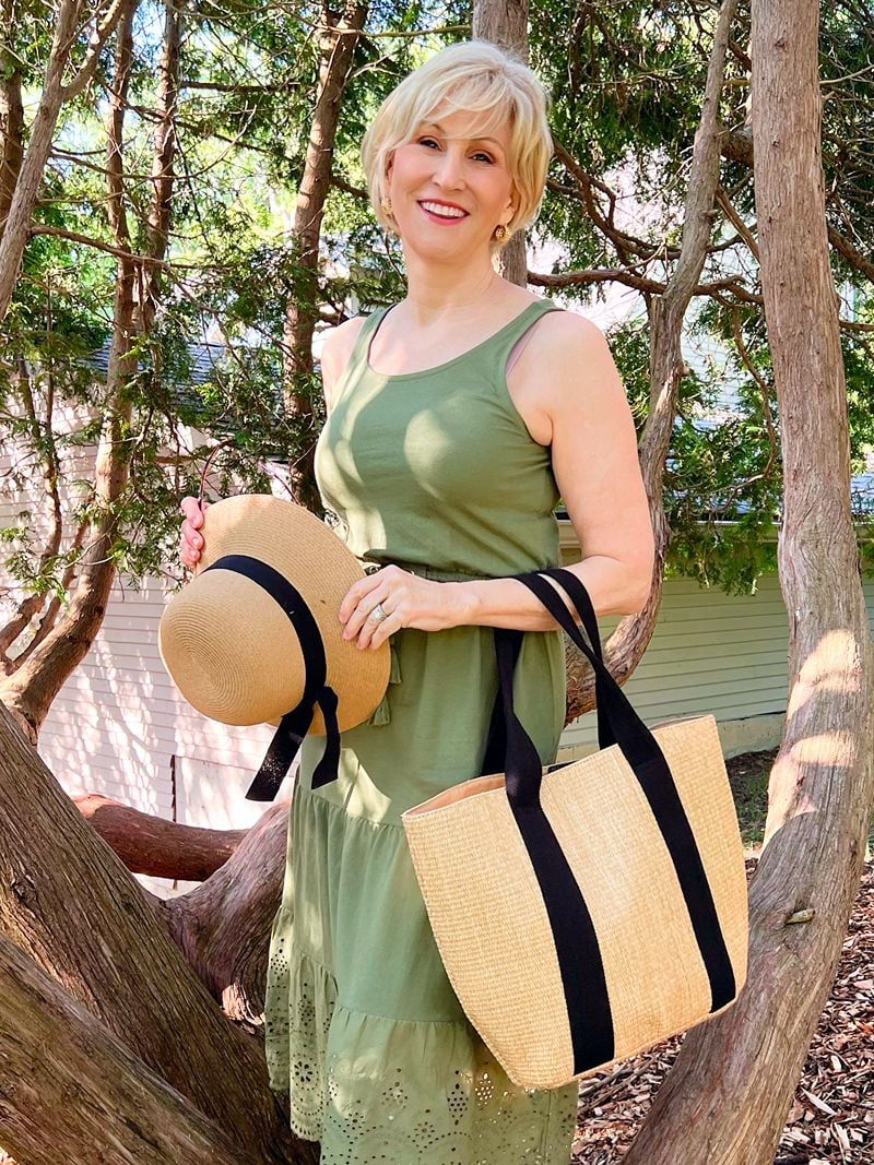 medium brim straw hat with green cotton sundress