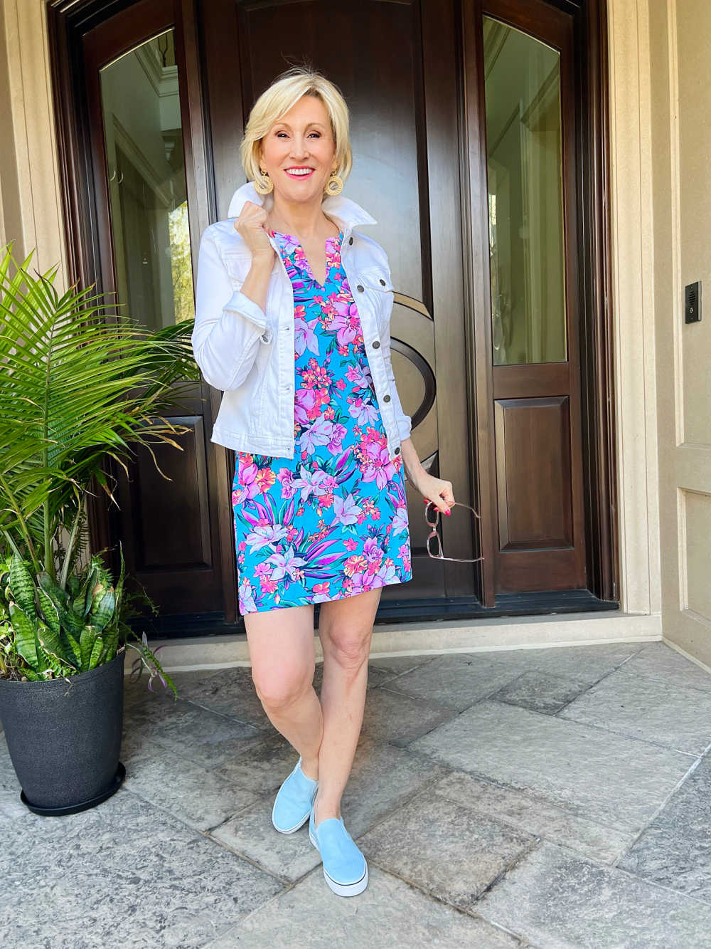 white jean jacket tropical sundress